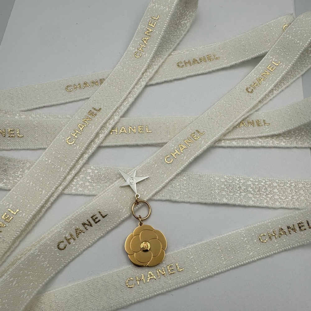 Chanel Camellia holiday charm w/Ribbon